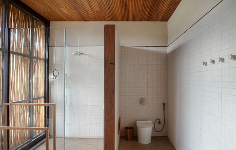 Taipa House Reimagines Vernacular Taipa For a Warm Modern Retreat - 8