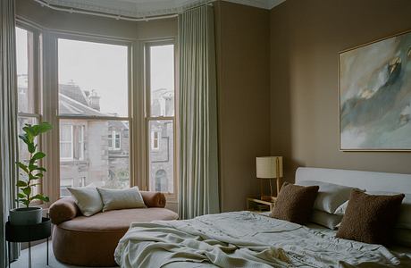 Catalog House Replans Two Flats Into a Light-Led Family Home