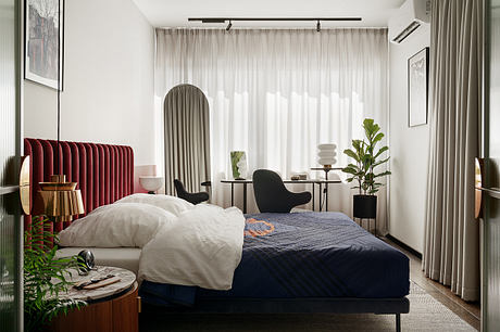 KSS Apartment Frames Warm Modern Interiors with Marble and Velvet - 7