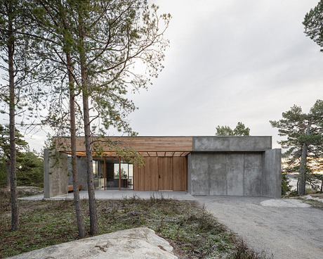 House Djurö Refines Indoor–Outdoor Living with Concrete Terrace - 9