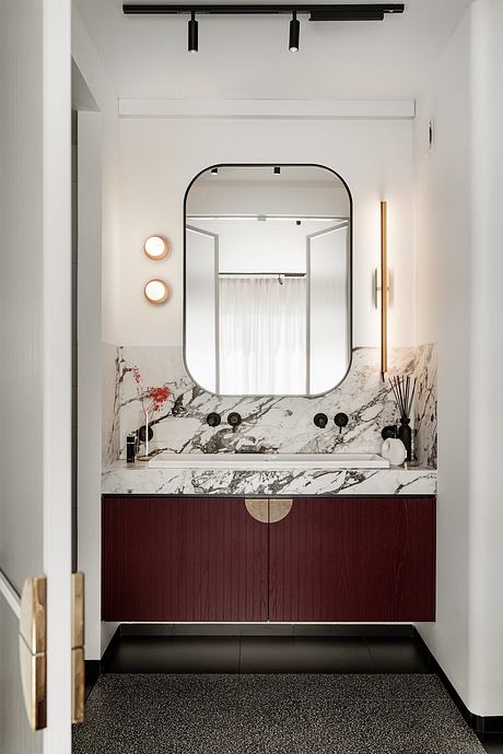 KSS Apartment Frames Warm Modern Interiors with Marble and Velvet - 10