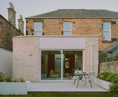 Catalog House Replans Two Flats Into a Light-Led Family Home - 10