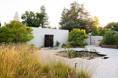 Wood, Water and Stone: Reclaimed Timber Grounds a Courtyard Retreat - 1