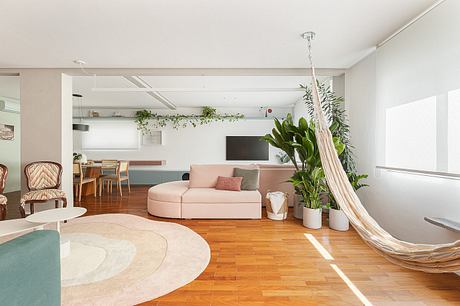 Aperol Apartment Balances Playful Color With Warm Cumaru Craft - 2