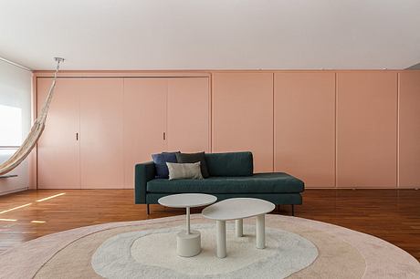 Aperol Apartment Balances Playful Color With Warm Cumaru Craft - 3