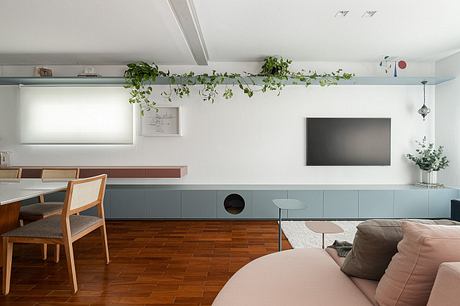 Aperol Apartment Balances Playful Color With Warm Cumaru Craft - 4