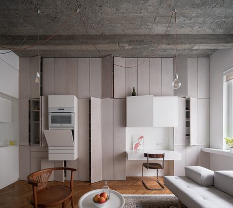 Functionalist Apartment with Pink Piggy Recasts a 1930s Prague Home - 3