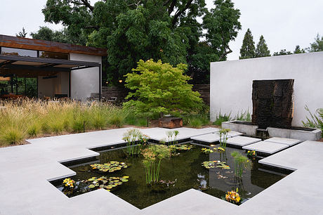 Wood, Water and Stone: Reclaimed Timber Grounds a Courtyard Retreat - 4