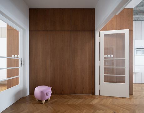 Functionalist Apartment with Pink Piggy Recasts a 1930s Prague Home - 6