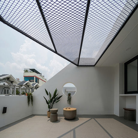 The Odd One Out: Compact Urban House Reimagines Daily Living Today - 6