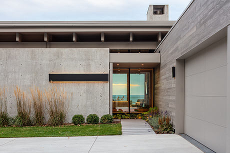 Lower Shore Residence Reframes Family Living With a Four-Season Room - 7