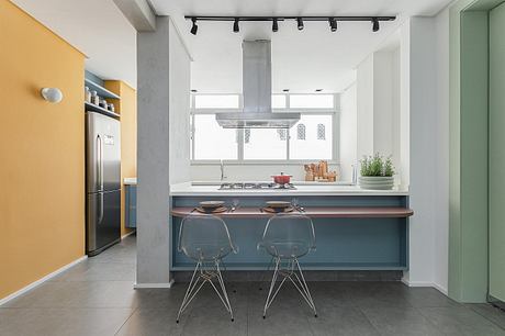 Aperol Apartment Balances Playful Color With Warm Cumaru Craft - 9