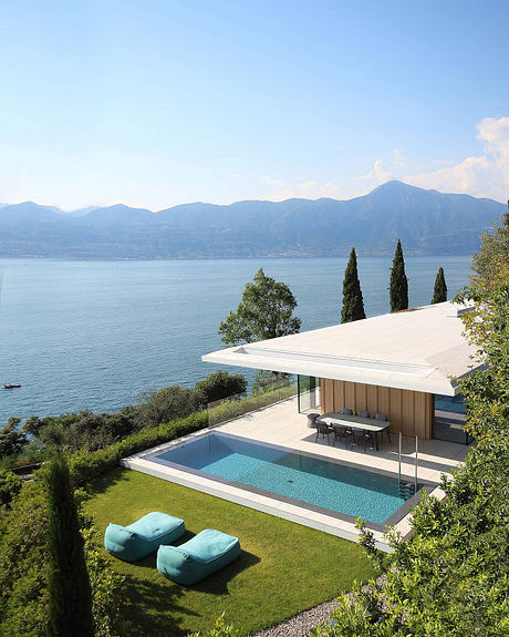 Villa Dellago Opens To Lake Light Through Twin Sunken Patios Below - 10