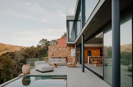 Between Sea and Stone: Tiered Mediterranean House in Sa Riera