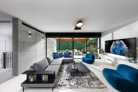 Concrete Harmony House Balances Cool Minimalism With Vivid Comfort - 1