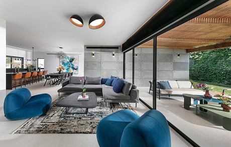 Concrete Harmony House Balances Cool Minimalism With Vivid Comfort - 2