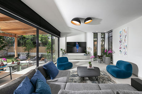 Concrete Harmony House Balances Cool Minimalism With Vivid Comfort - 3