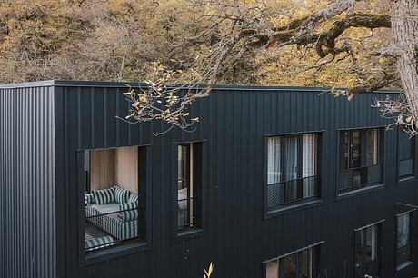 Hotel KHIDI Reframes Forest Views With Warm Timber-Rich Interiors - 9