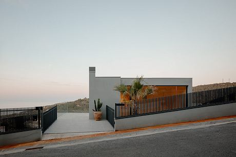 Between Sea and Stone: Tiered Mediterranean House in Sa Riera - 11