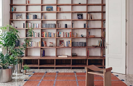 Contemporary Classic: Warm Italian Apartment with Sculpted Details