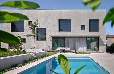 House in Čakovice: Calm Minimalist House for a Growing Prague Family