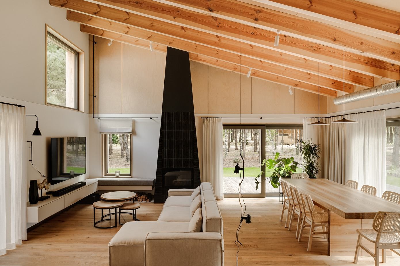 Wooden house next to Konin by Studio GAB