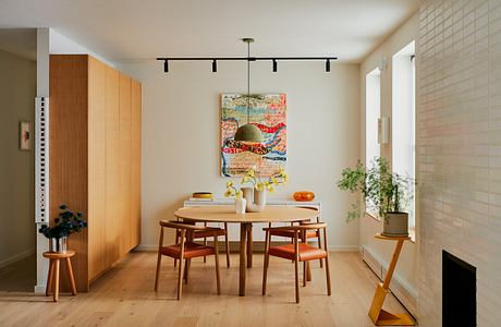 No 343 Reframes City Living Through Warm Wood And Playful Art Inside