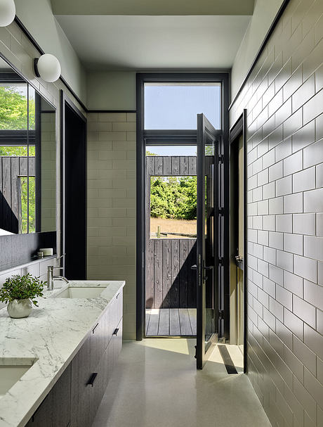 East Hampton Modern: Shou Sugi Ban Gables Shape a Coastal Hideaway - 5