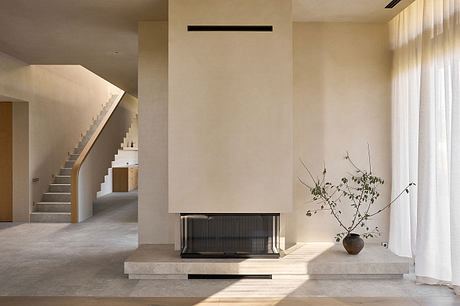 Shift House: Minimalist Wood and Plaster Interiors for a Large Family - 3