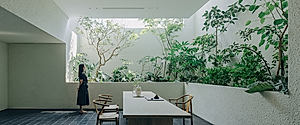 House J: Tiered Courtyards Shape a Home for Distant Generations