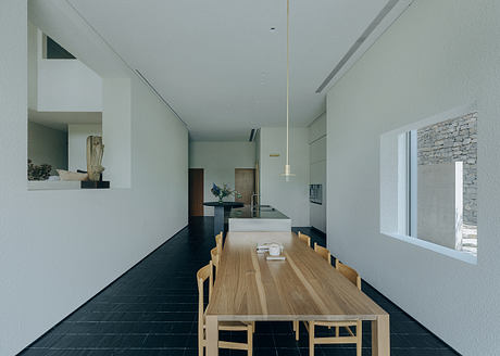 House J: Tiered Courtyards Shape a Home for Distant Generations - 4