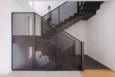 Brutalist Panorama Recasts Hillside Living - 5