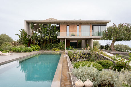 Casa A12 in Aci Castello Pairs Boardlike Concrete with Lava Stone - 1