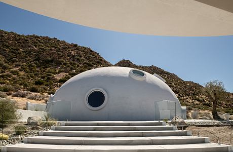 Hata Dome Captures Mountain Horizons with a Sculpted Monolithic Shell