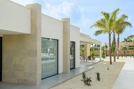 House P02: Mediterranean Villa Framed By Stone, Light, and Water Lines - 1