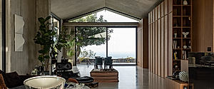 Casa A12 in Aci Castello Pairs Boardlike Concrete with Lava Stone