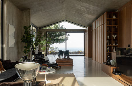 Casa A12 in Aci Castello Pairs Boardlike Concrete with Lava Stone