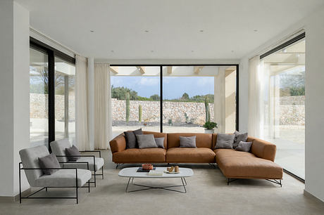 House P02: Mediterranean Villa Framed By Stone, Light, and Water Lines - 2