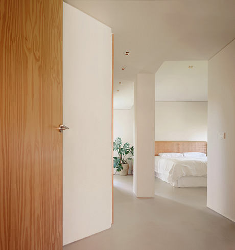 L10 House Reframes a 1970s Coastal Home with Quiet Precision - 6