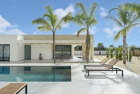 House P02: Mediterranean Villa Framed By Stone, Light, and Water Lines - 7