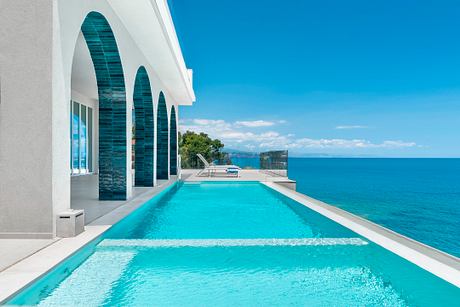 Baia del Silenzio House Recasts a 1970s Shell for Coastal Living - 1