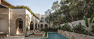 Casa Colina Explores Arches, Stone, and Courtyard Living in Tulum