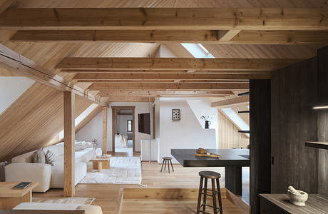 Cottage a Vysočina Recasts The Attic With Dark Timber