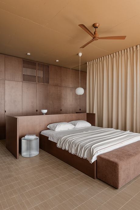 Limestone Project Uses Earth Tones to Shape Quiet Guest Rooms Inside - 1