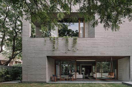 MS House: Brutalist Concrete Wrapped Around Nine Ancient Neem Trees - 1
