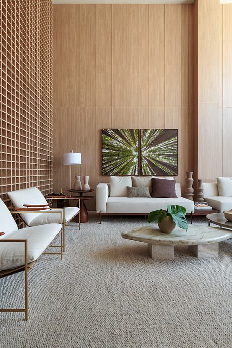 Cerâmica Apartment Shapes Calm Interiors Through Warm Stone and Wood - 2