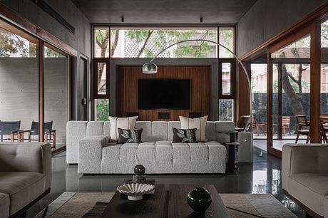 MS House: Brutalist Concrete Wrapped Around Nine Ancient Neem Trees - 2