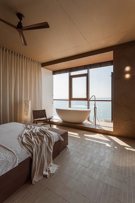 Limestone Project Uses Earth Tones to Shape Quiet Guest Rooms Inside - 3