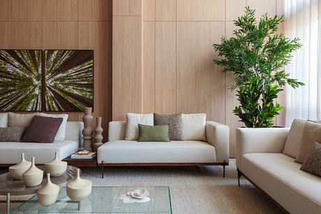 Cerâmica Apartment Shapes Calm Interiors Through Warm Stone and Wood - 3