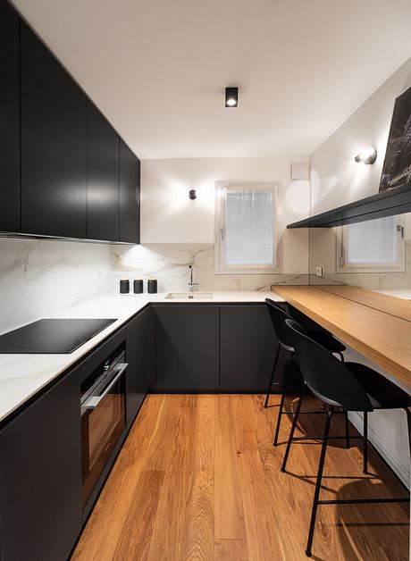 Urban Villa in Milan Balances Light, Warmth, and Height Inside - 4